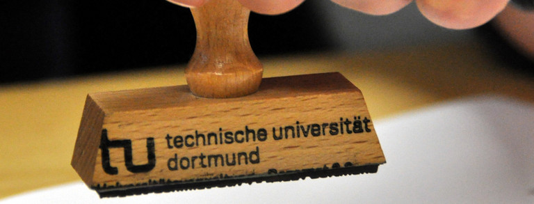 Close-up of a stamp of TU Dortmund University