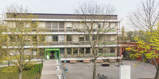 Student affairs office Student affairs office with trees in front of it.